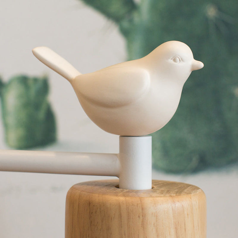 Holzvogel-Wandlampe
