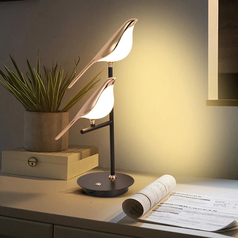 Goldene Vogel-Wandlampe
