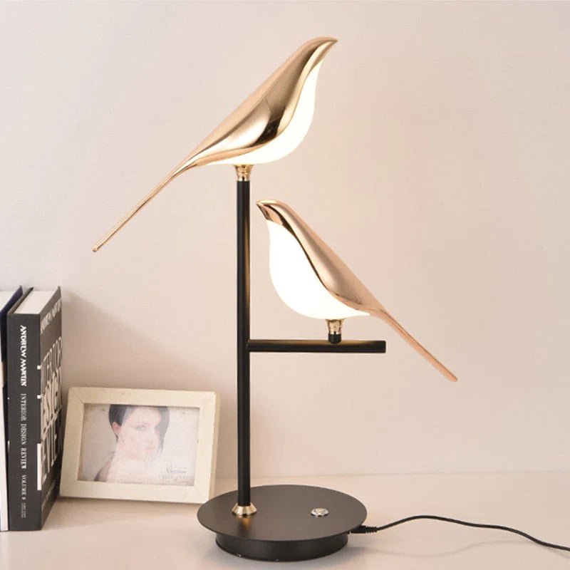 Goldene Vogel-Wandlampe